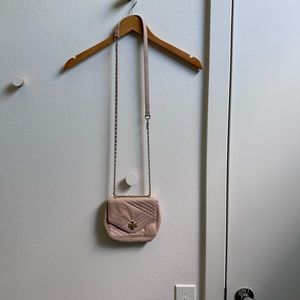 Small Tory Burch pinkish colour purse with clasp and gold chain strap